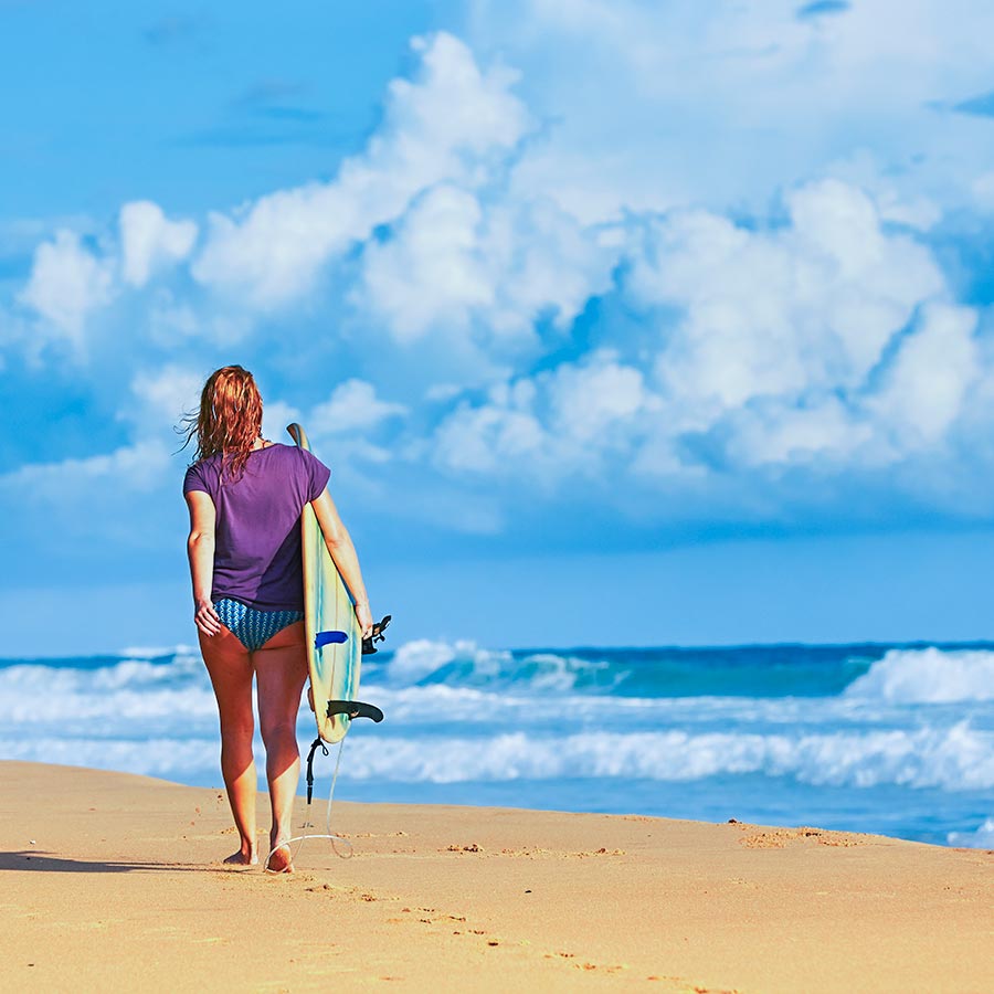 A Surfing Girl on the Beach