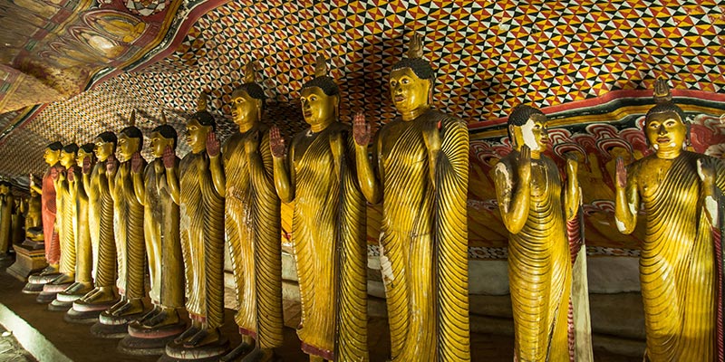 Numerous Buddha statues at Dambulla Rock Temple