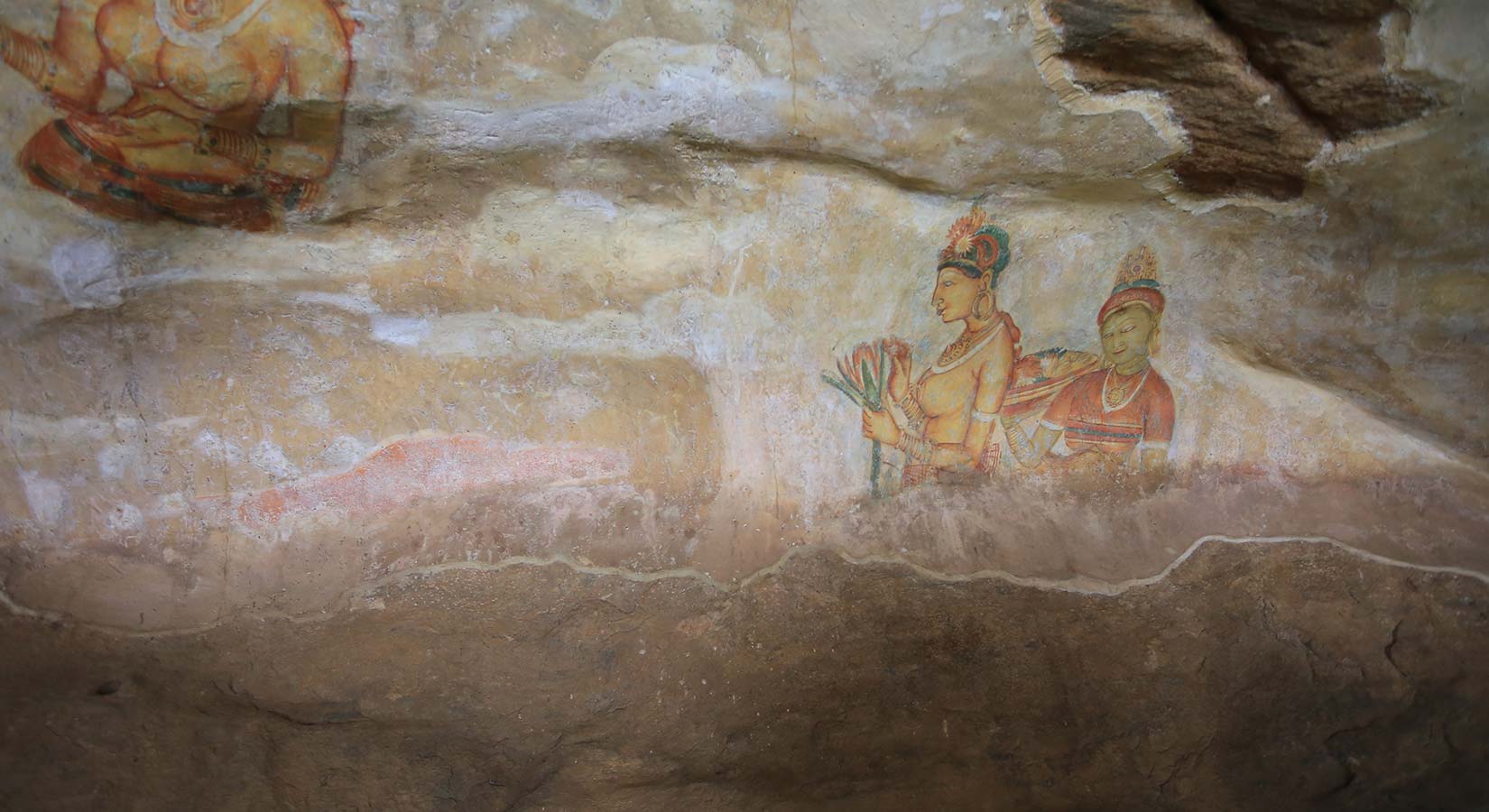 https://www.steuartholidays.com/wp-content/uploads/2019/03/Frescoes-in-Sigiriya-Rock-Fortress-1.jpg